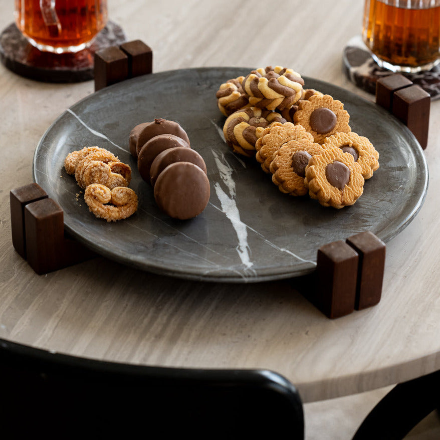 Pietra Grey Marble serving plate set on a solid wooden base