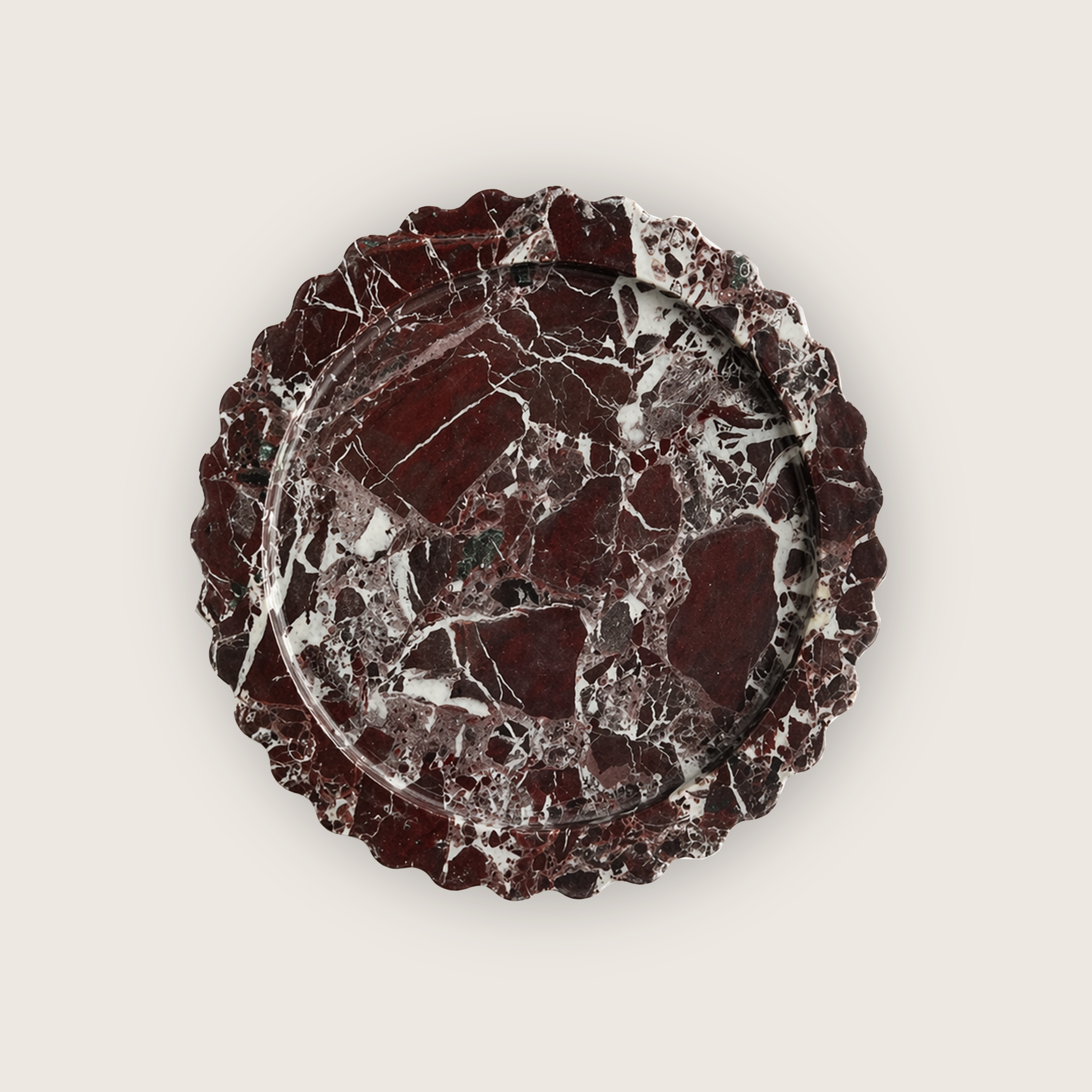 Decorative plate made with rosso marble with fluted edges