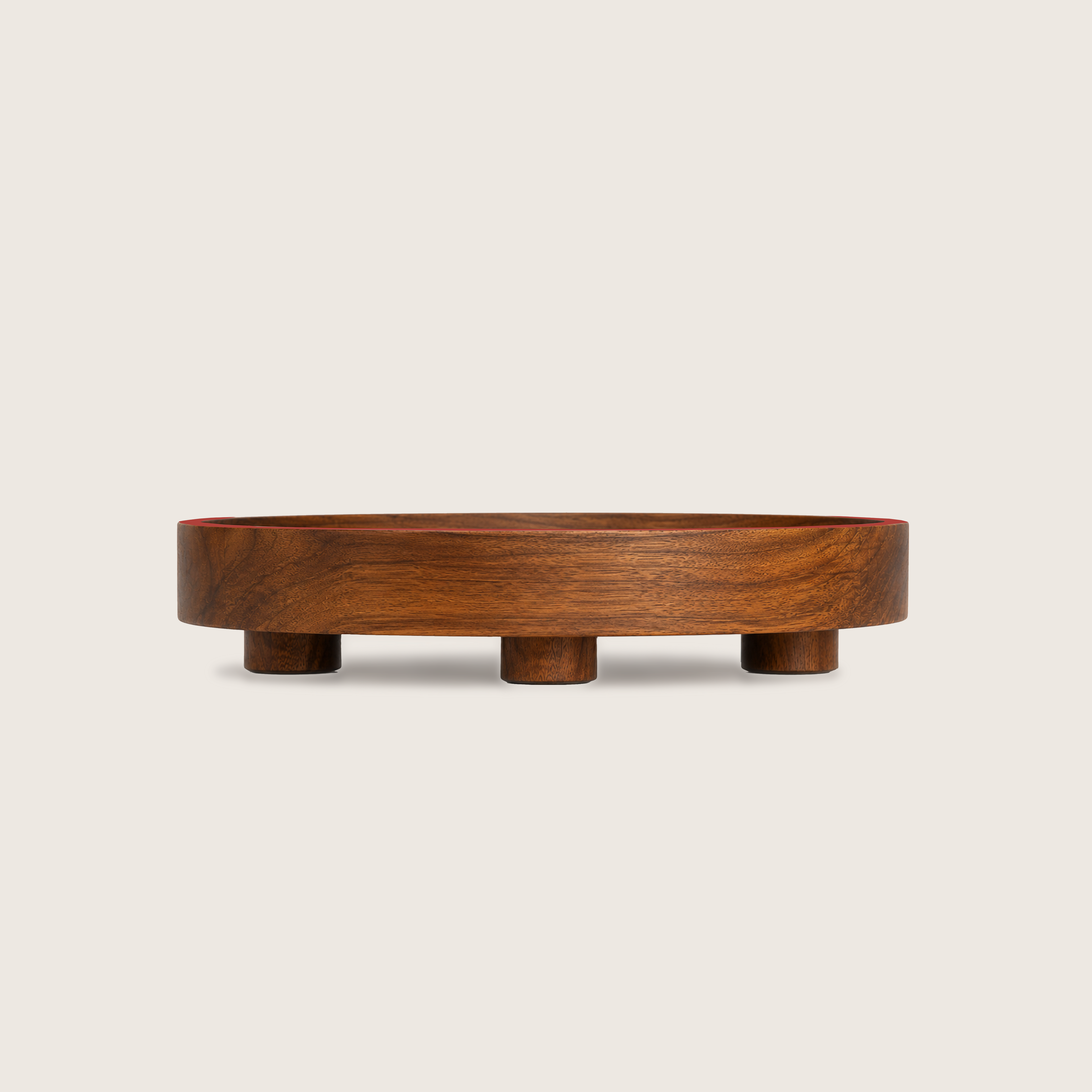 natural wood serving plate with red edge with 3 legs